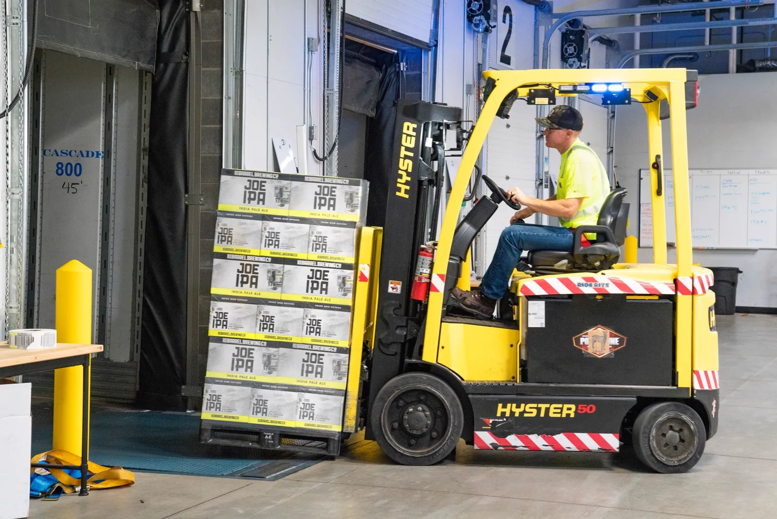 Used Hyster pneumatic tire forklift working an outdoor yard in Delaware