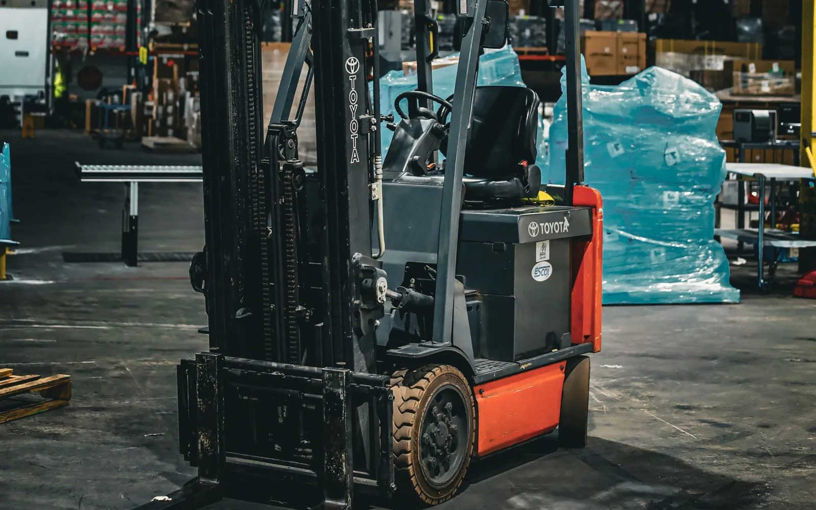 Used Toyota electric counterbalanced forklift in a Delaware warehouse